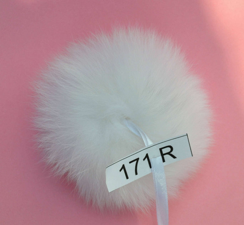 white fox pom pom