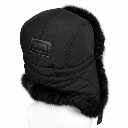 Rear view of black fur-trimmed hat on mannequin