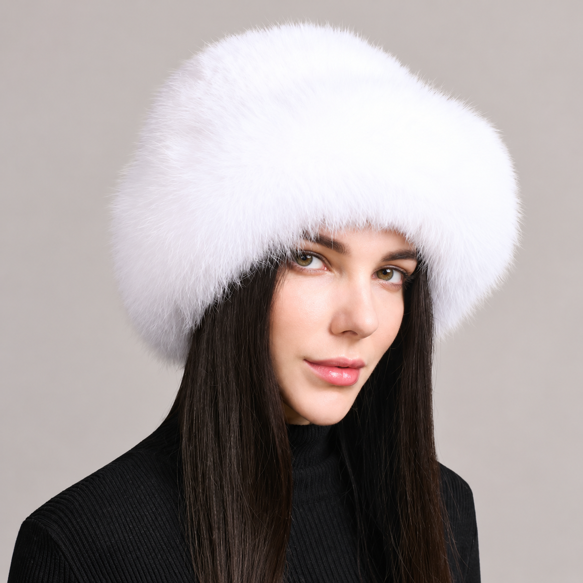 White fluffy fox fur brim hat with a knitted mink crown, shown from the front on a model.