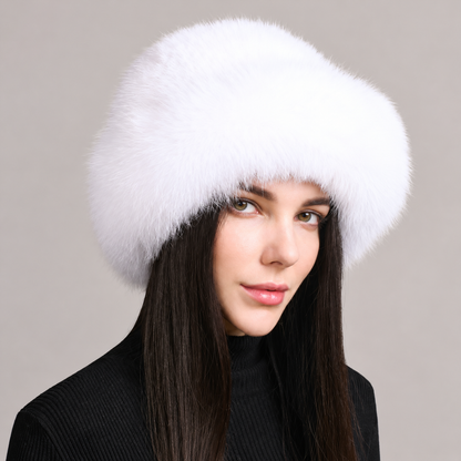 White fluffy fox fur brim hat with a knitted mink crown, shown from the front on a model.
