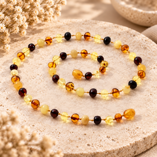 Authentic Amber Multicolor Necklace styled on warm beige stone