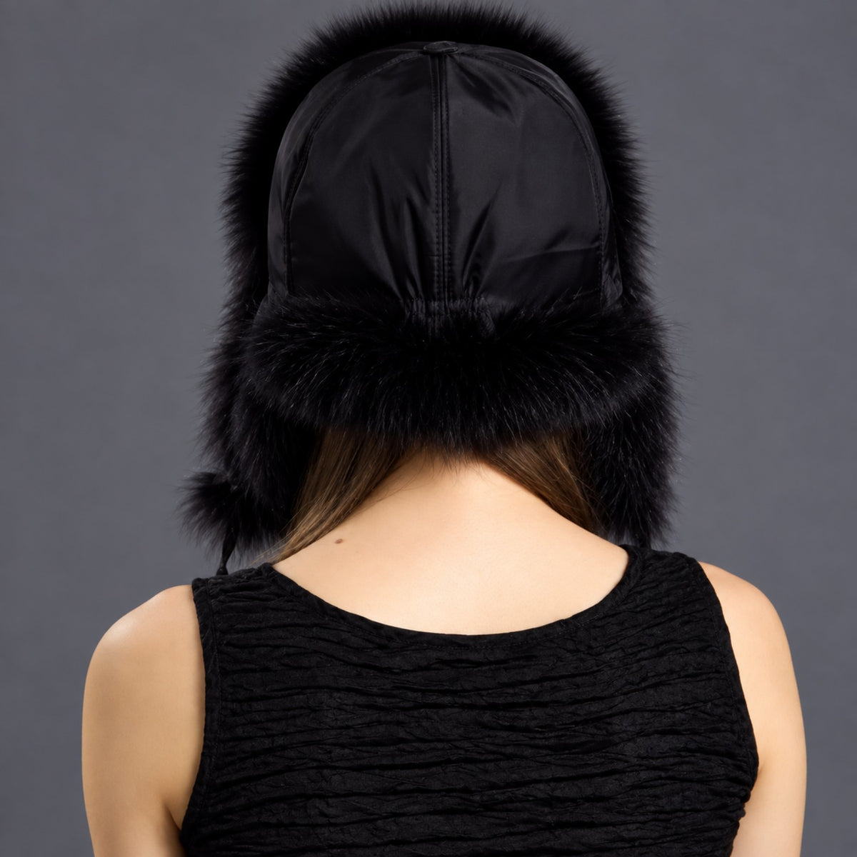 Blue fox fur ushanka hat back view with satin crown