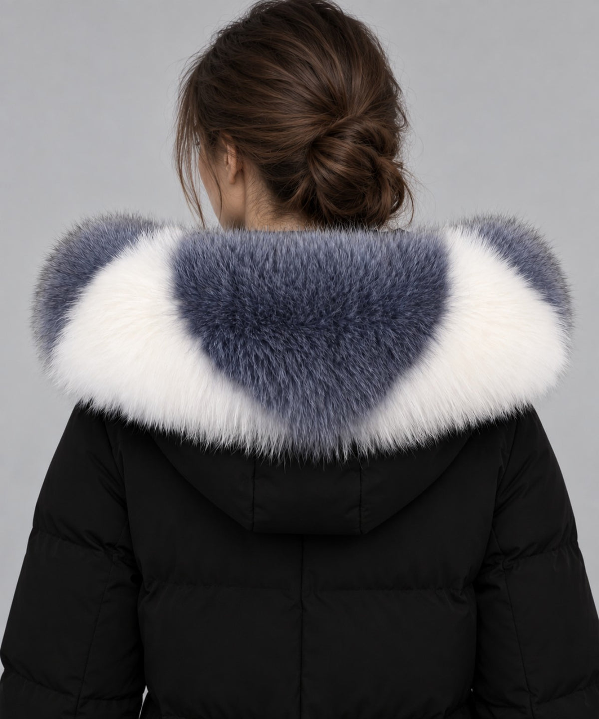 Gray and white real fox fur collar on black coat – back view