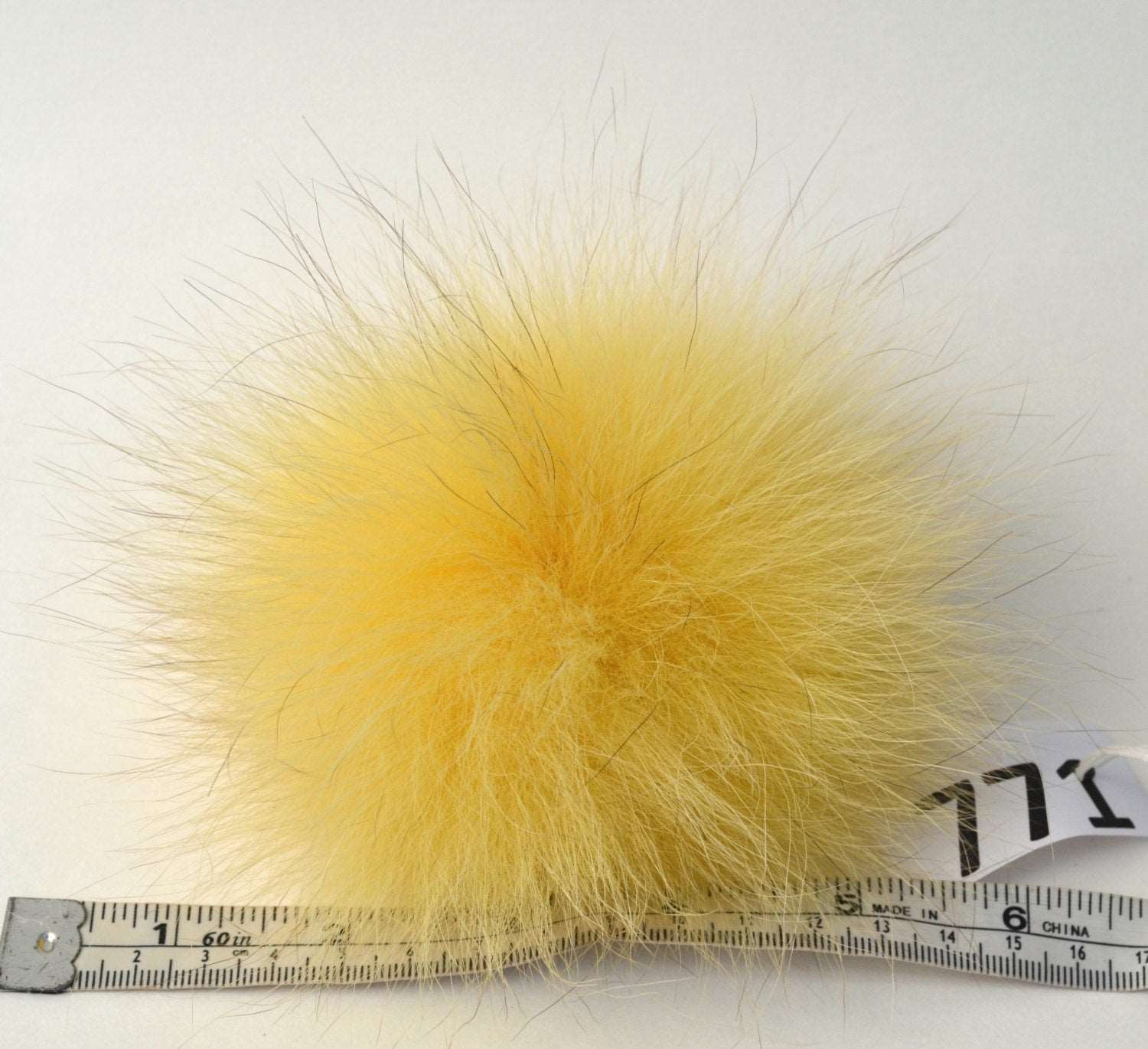 yellow fox pom pom