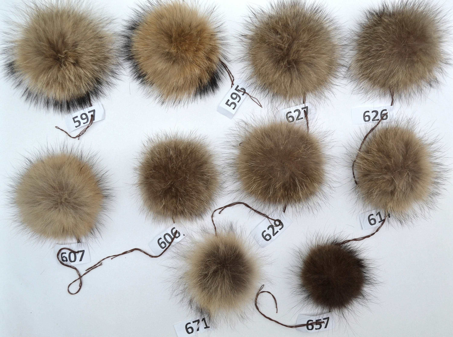 raccoon pom poms