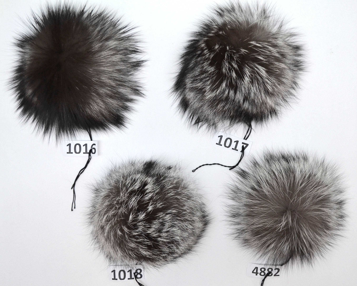 fluffy pom pom hat