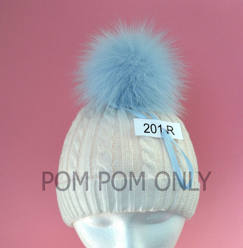 kit hat with pom pom