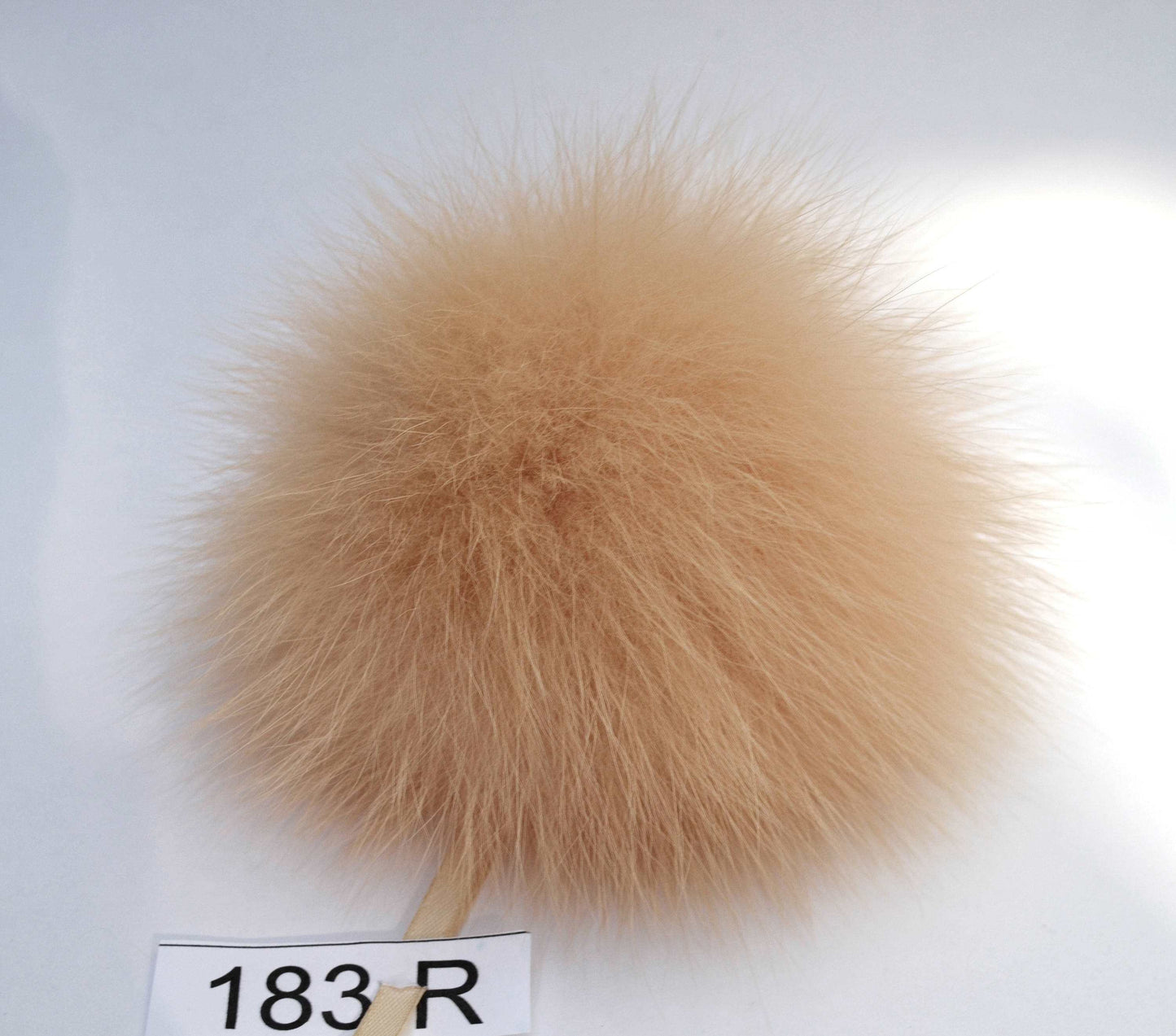 orange fox pom pom