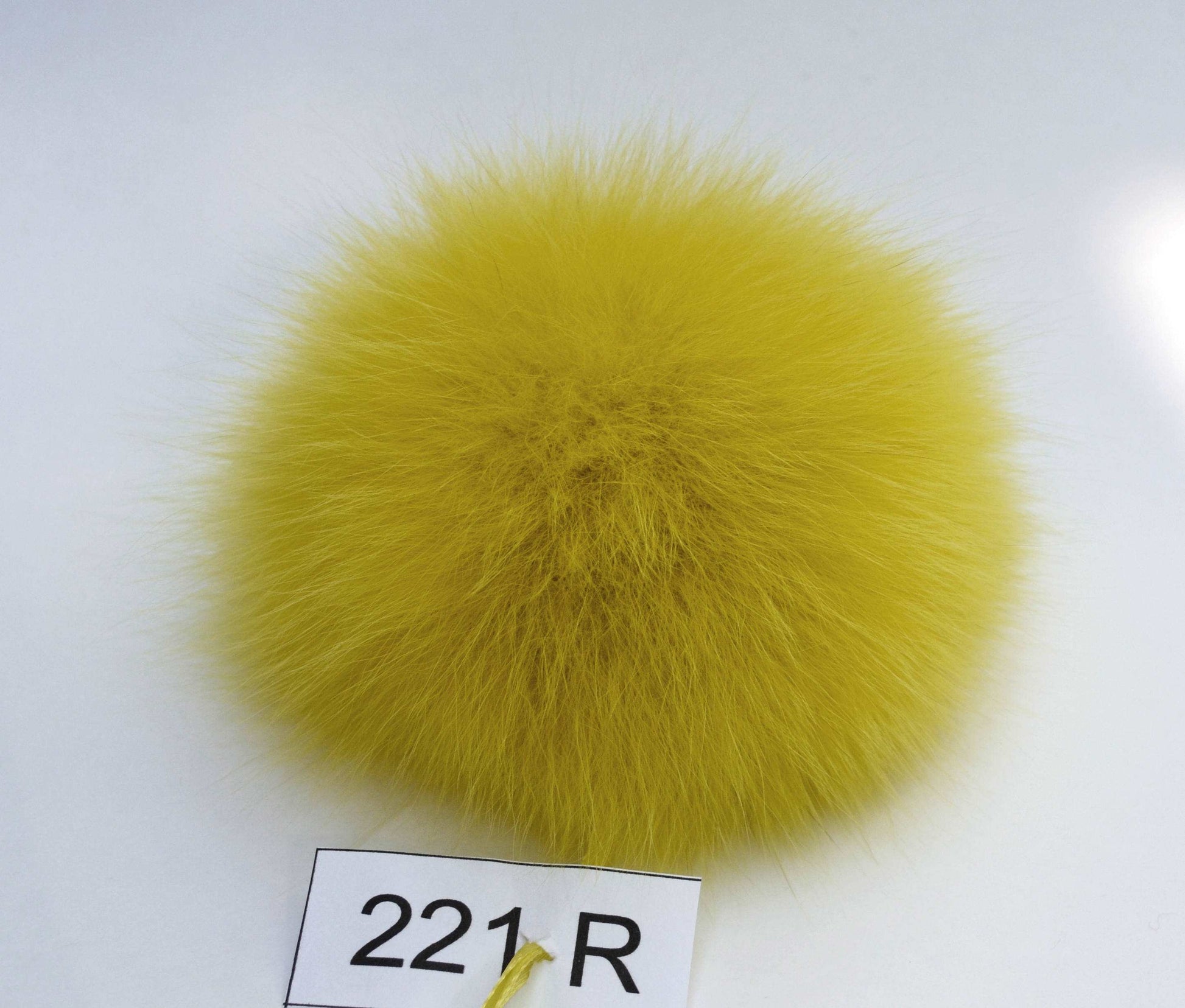 yellow fox pom pom
