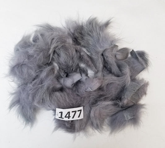 Green raccoon fur scraps and real fur pieces for crafts