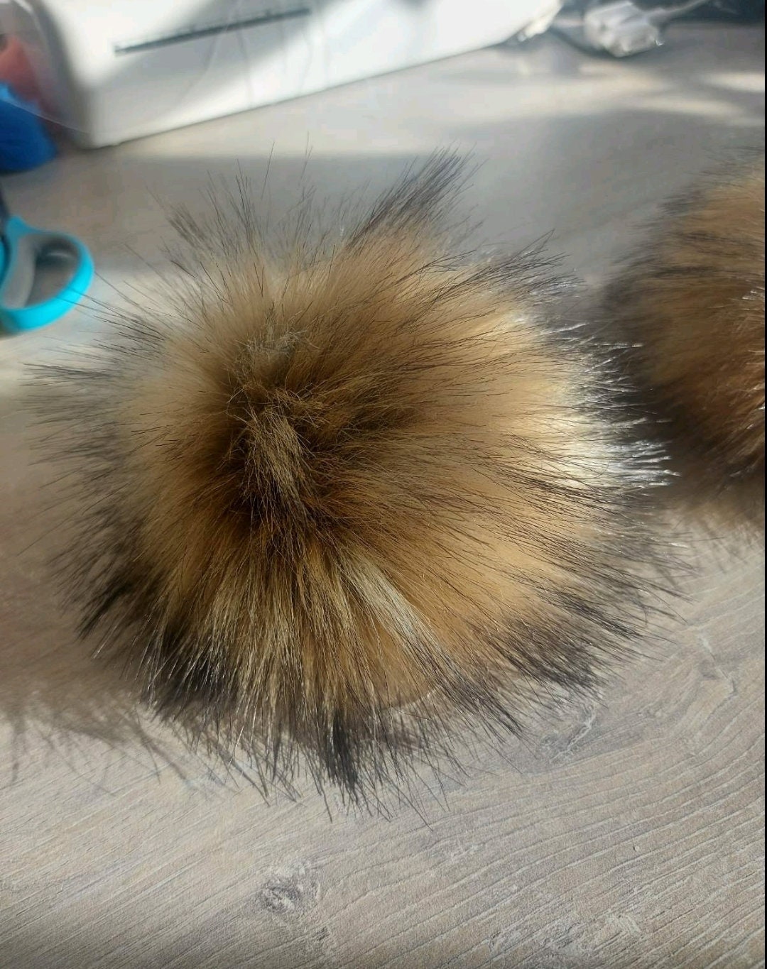 Large faux raccoon fur pom poms for hats and crafts – view 3