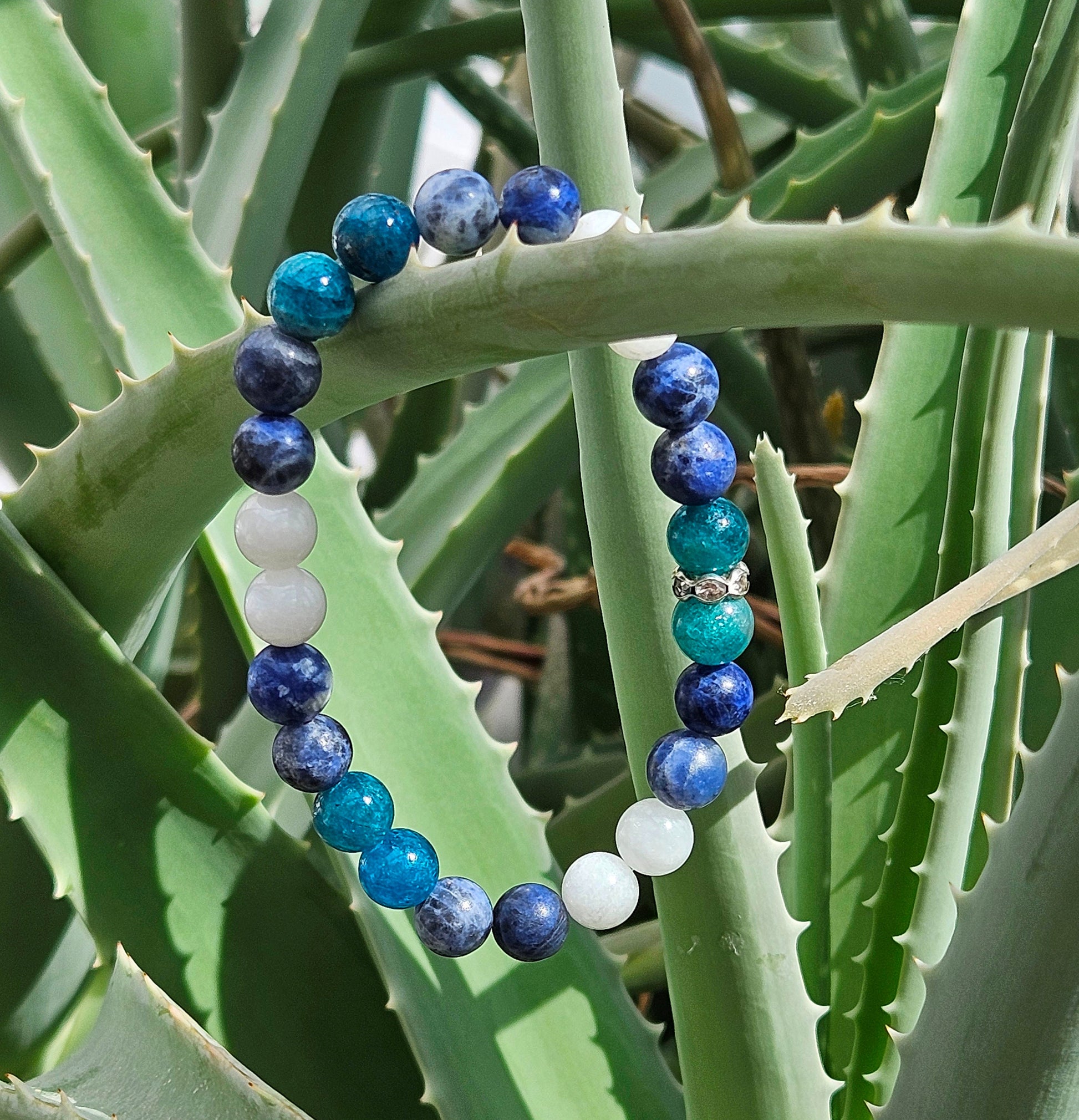WATER ELEMENT BRACELET ( such zodiac signs as cancer, pisces, scorpio) features soothing blue and white gemstones like White Jade, Sodalite and Apatite to promote emotional healing, intuition, and creativity