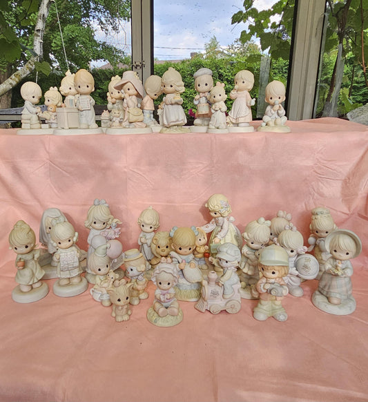 Precious Moments figurines  (Enesco, Jonathan $ David, Samuel J. Butcher ) brand, some of them in the original boxes