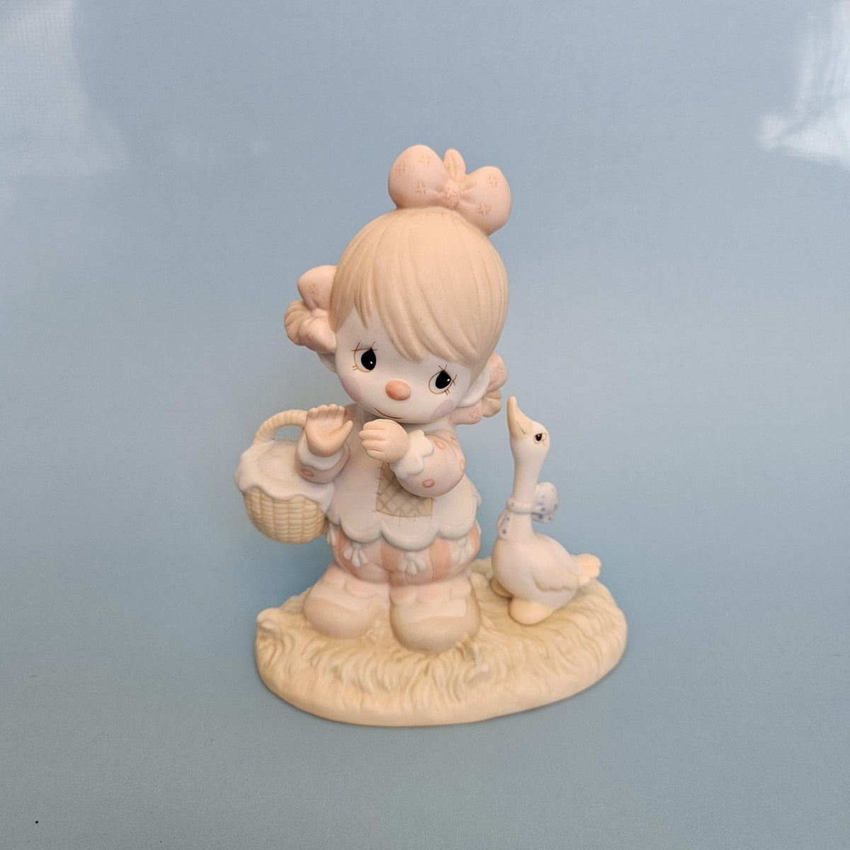 Precious Moments Waddle I Do Without You figurine with goose, front view