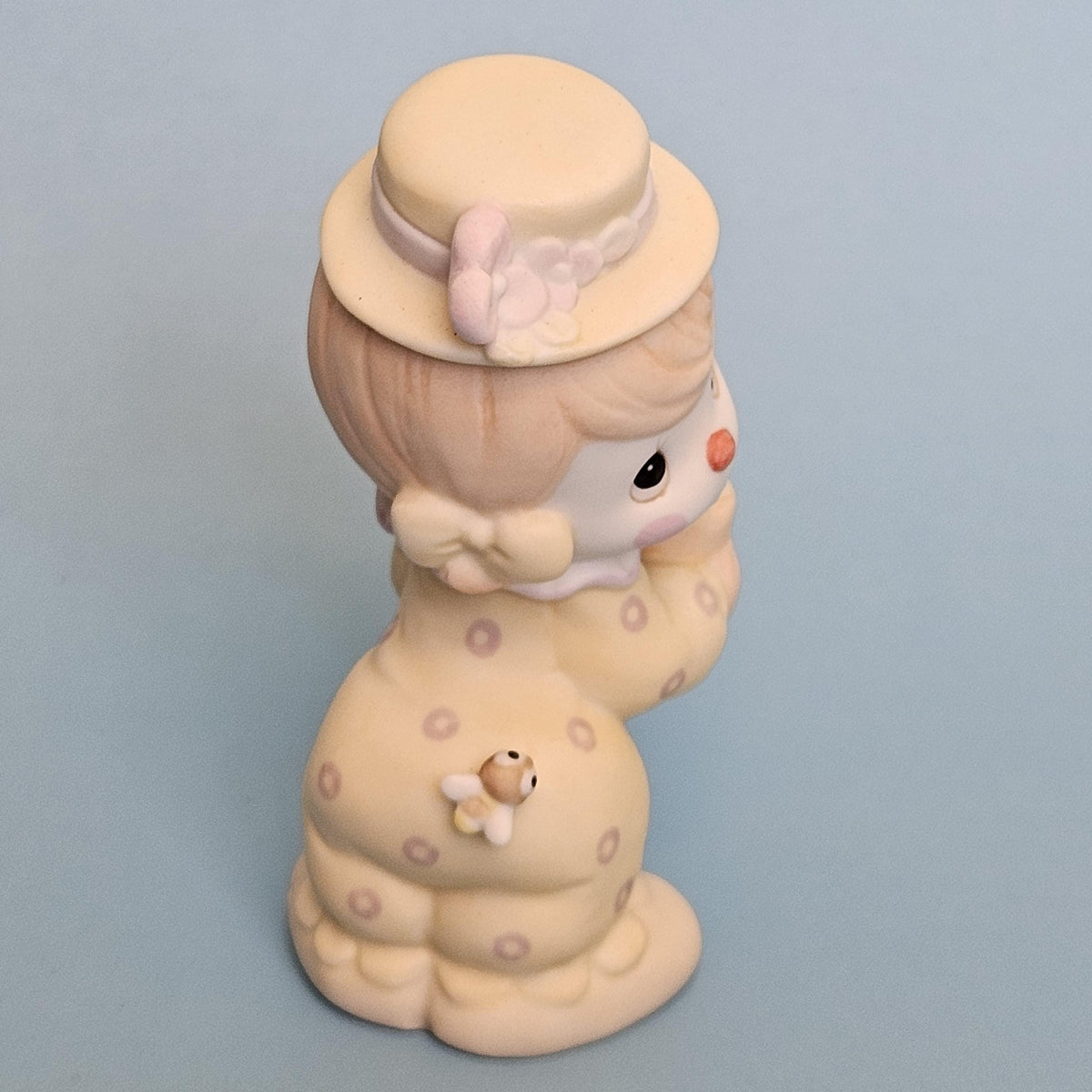 Side view of Precious Moments Clowns figurine
