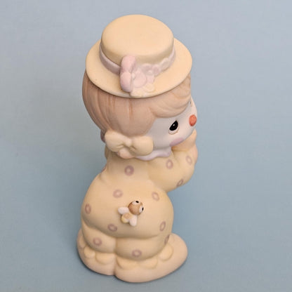 Side view of Precious Moments Clowns figurine