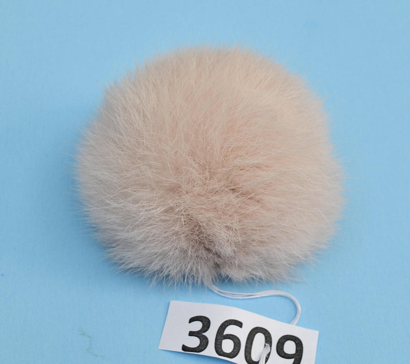 large fur pom pom